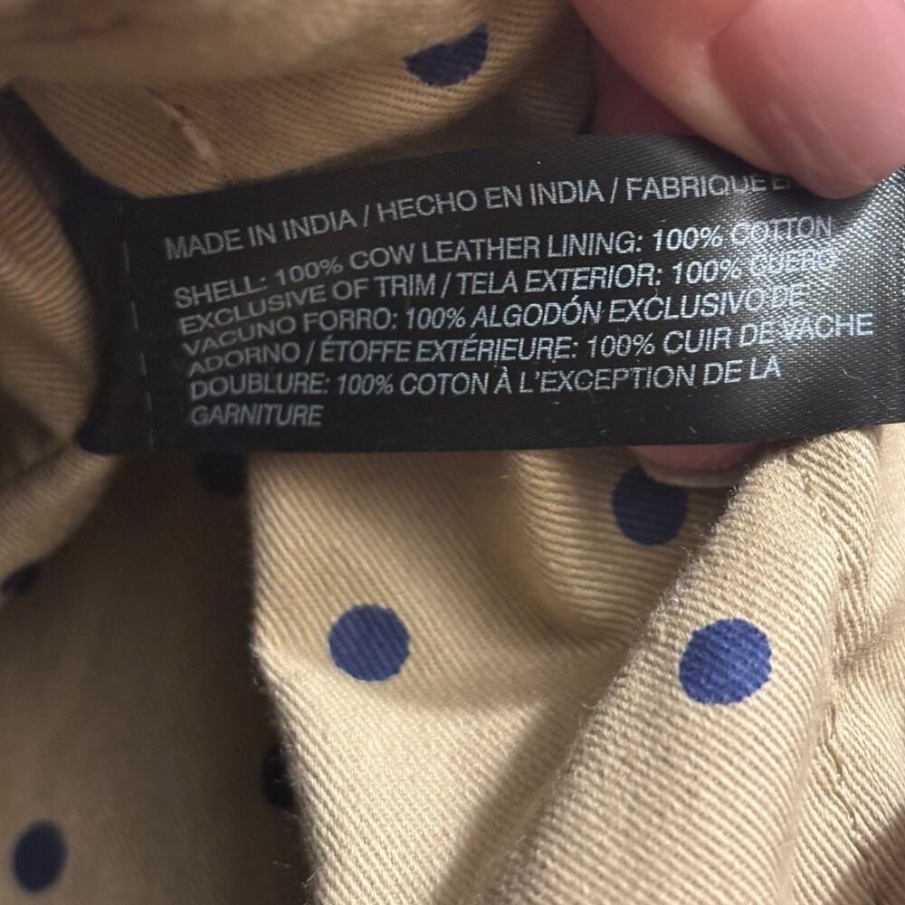 Chico's Navy Laser-Cut Bucket Crossbody with Tan Liner - Picture 9 of 9